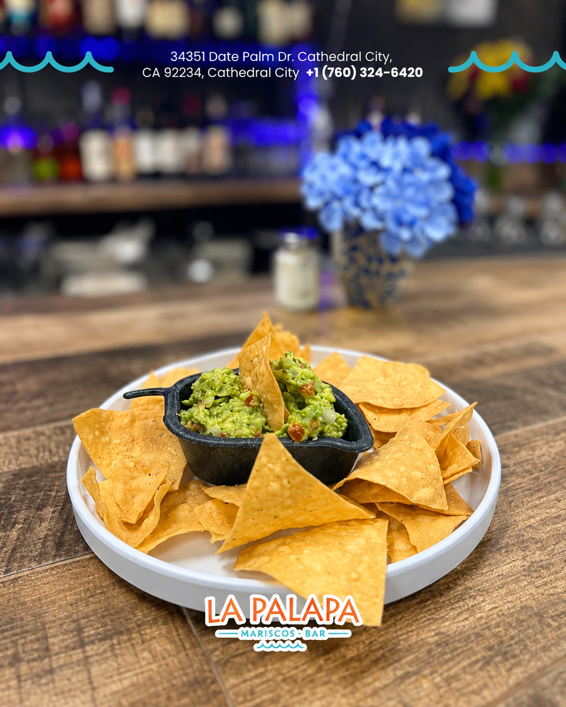 Fresh guacamole served with tortilla chips.